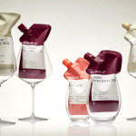 Single-serve wine pouches in glasses.