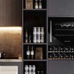 Kleenmaid built-in wine fridge in a black kitchen.