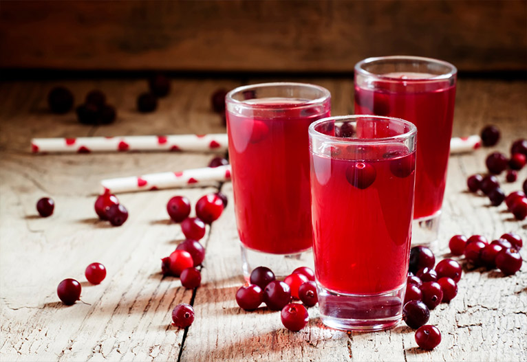 Cranberry juice in tall glasses.