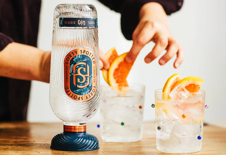 Forty Spotted Classic Gin being prepared in drinks with fresh orange.