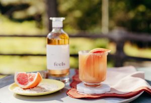 Feel Botanicals Revel on an outdoor table.