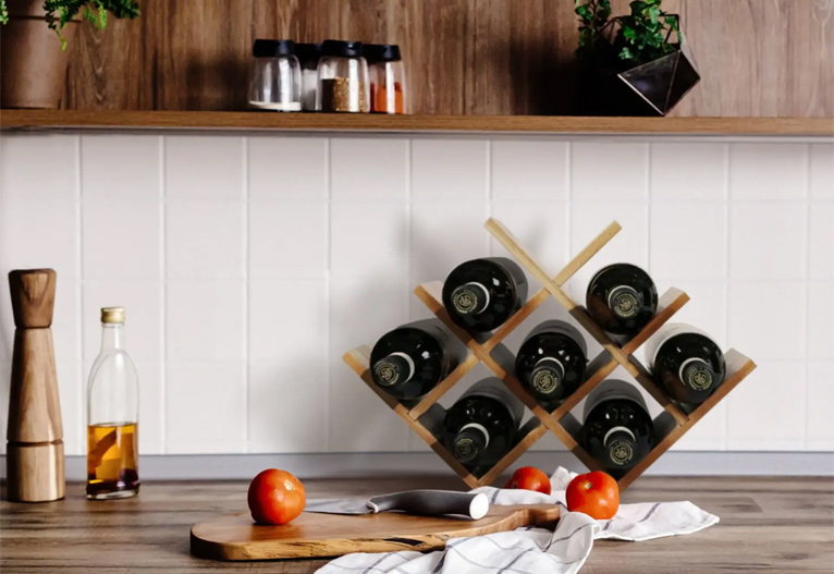Acacia wood wine rack on a kitchen bench.