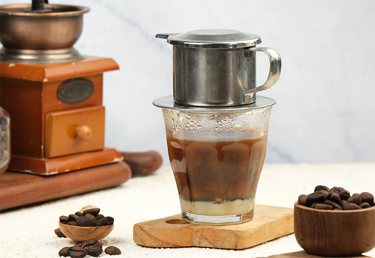 Vietnamese iced coffee with a phin.