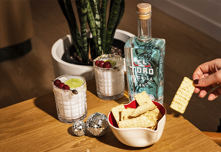 El Toro Coconut Tequila and two margarita cocktails.