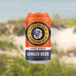 Hurricane Head Zero Sugar Ginger Beer on beach backdrop.