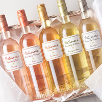Patisserie wine collection in a basket.