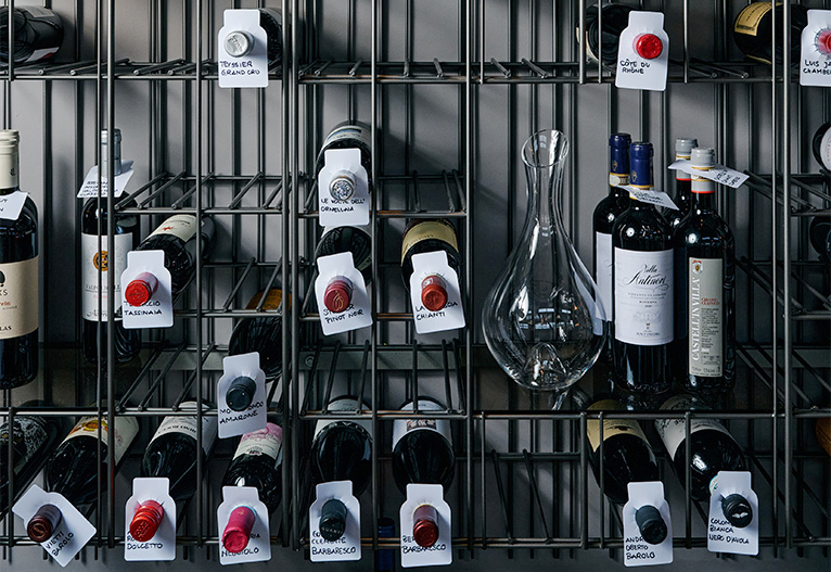 Sincero wine rack filled with bottles.